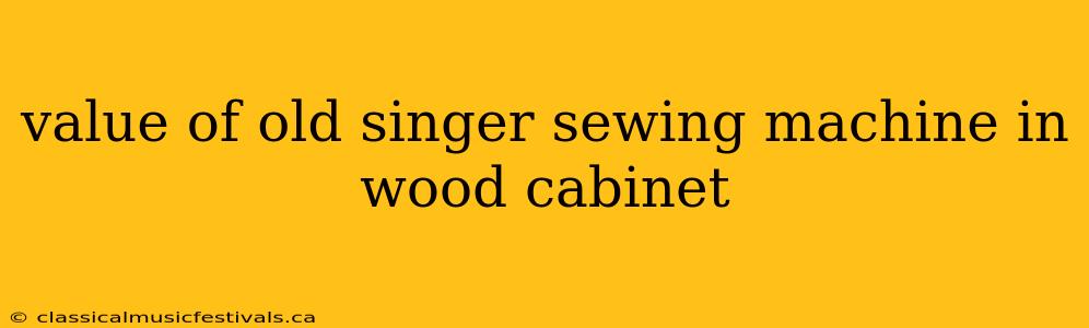 value of old singer sewing machine in wood cabinet